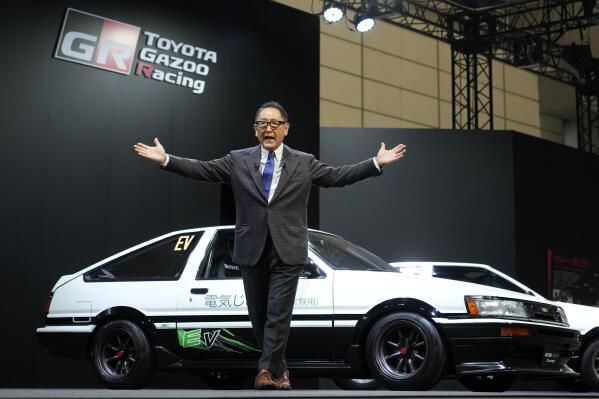 Toyota pushes zero emission goals by converting old models AP News